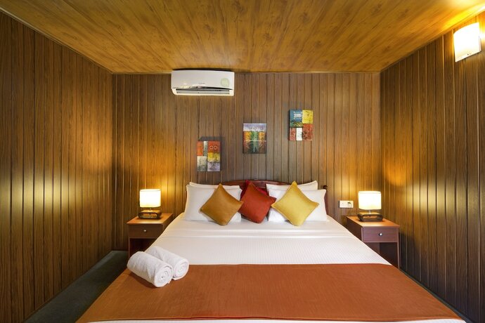 Imagen de la habitación del Hotel Palm Beach Inn and Sea Shells Cabanas. Foto 14