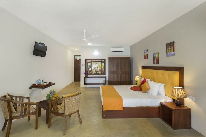 Imagen de la habitación del Hotel Palm Beach Inn and Sea Shells Cabanas. Foto 16