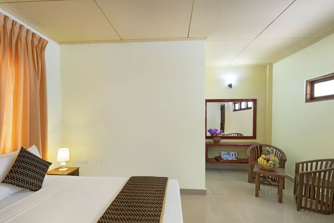 Imagen de la habitación del Hotel Palm Beach Inn and Sea Shells Cabanas. Foto 21