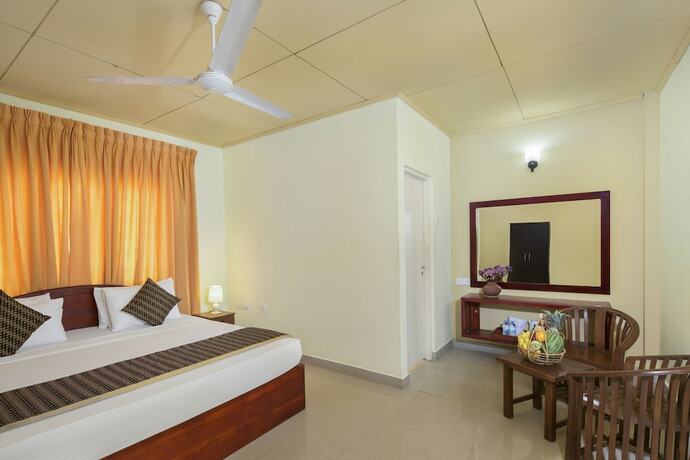 Imagen de la habitación del Hotel Palm Beach Inn and Sea Shells Cabanas. Foto 22