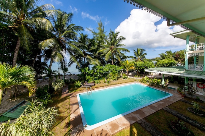 Imagen de la piscina del Hotel Palm Beach, PRASLIN. Foto 18