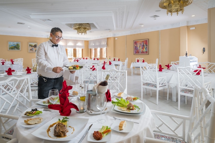 Imagen del bar/restaurante del Hotel Palm Beach Palace Tozeur. Foto 2