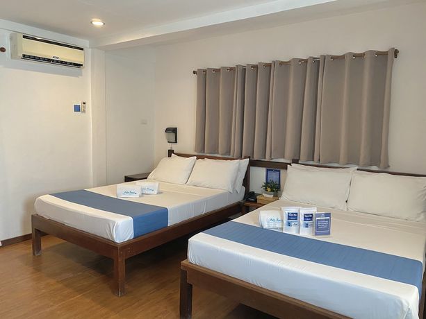 Imagen de la habitación del Hotel Palm Beach Resort, Hugom. Foto 6