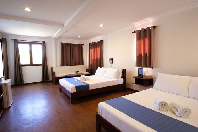 Imagen de la habitación del Hotel Palm Beach Resort, Hugom. Foto 14