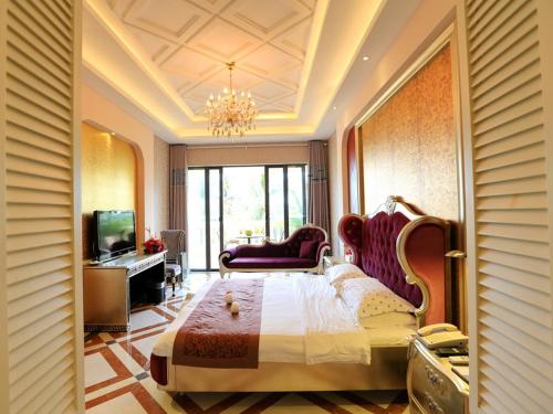 Imagen de la habitación del Hotel Palm Beach Resortandspa Sanya. Foto 6