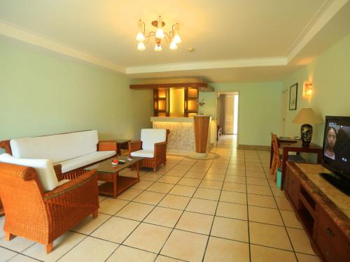 Imagen de la habitación del Hotel Palm Beach Resortandspa Sanya. Foto 7