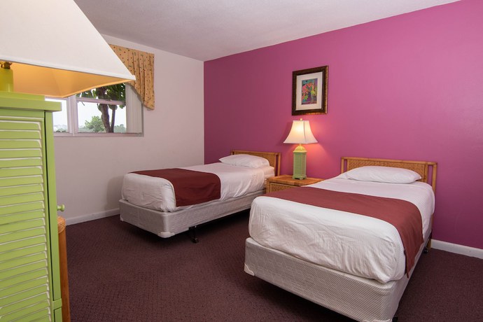 Imagen de la habitación del Hotel Palm Beach Waterfront Suites. Foto 13