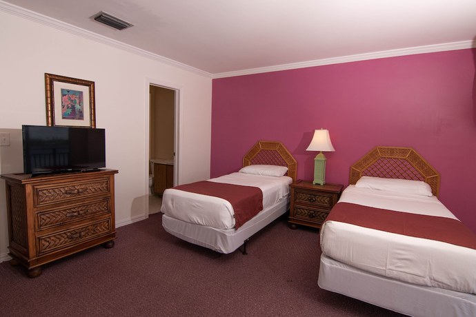 Imagen de la habitación del Hotel Palm Beach Waterfront Suites. Foto 16