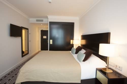 Imagen de la habitación del Hotel Palm Camayenne. Foto 3