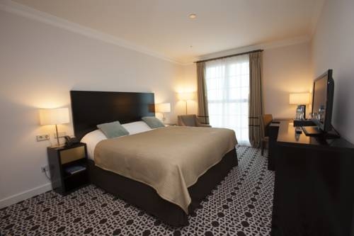 Imagen de la habitación del Hotel Palm Camayenne. Foto 5