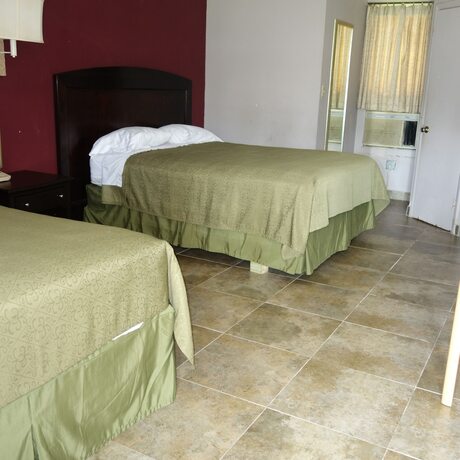 Imagen de la habitación del Hotel Palm City Motel. Foto 11