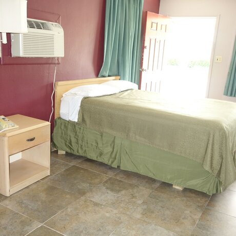 Imagen de la habitación del Hotel Palm City Motel. Foto 16