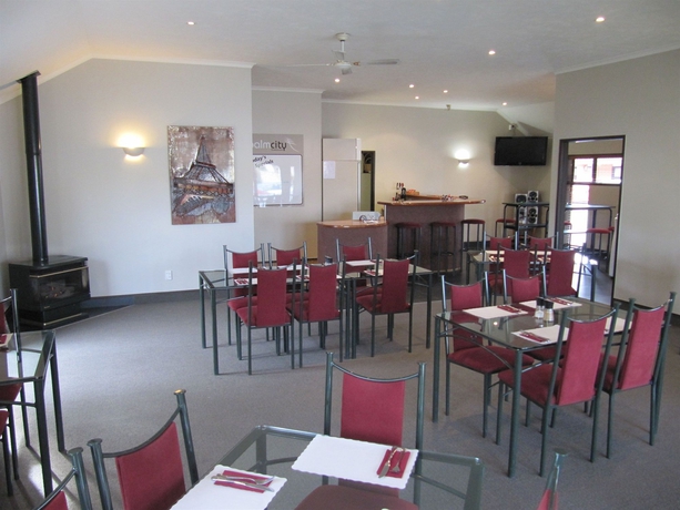 Imagen del bar/restaurante del Hotel Palm City Motor Inn. Foto 4