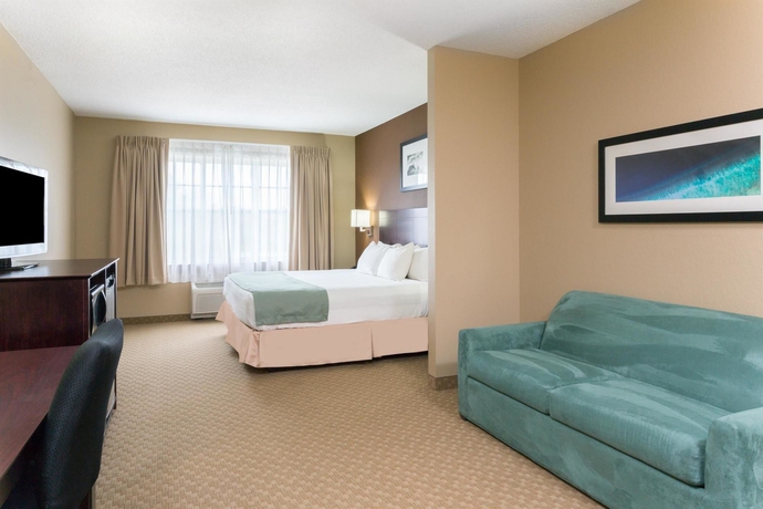 Imagen de la habitación del Hotel Palm Coast and Suites. Foto 3