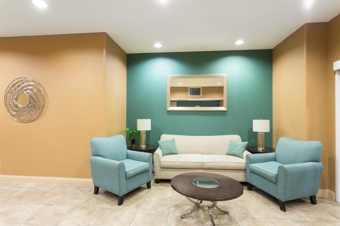 Imagen de los interiores del Hotel Palm Coast and Suites. Foto 12