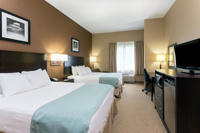 Imagen de la habitación del Hotel Palm Coast and Suites. Foto 8