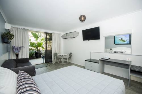 Imagen de la habitación del Hotel Palm Court Motor Inn. Foto 2