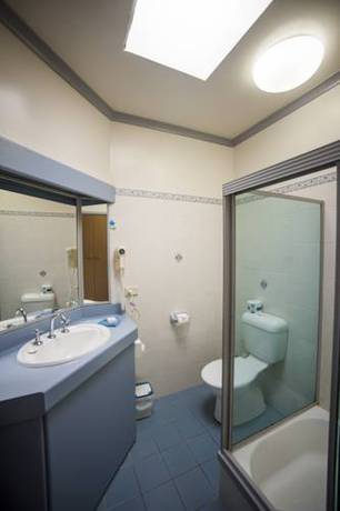 Imagen de la habitación del Hotel Palm Court Motor Inn. Foto 3