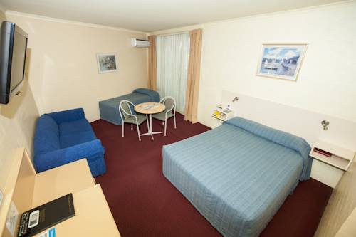 Imagen de la habitación del Hotel Palm Court Motor Inn. Foto 4