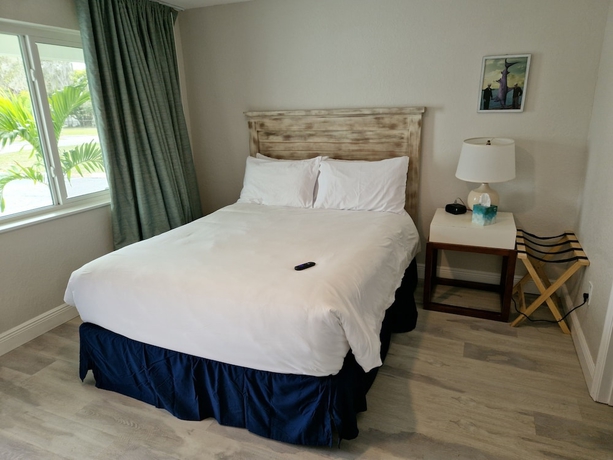 Imagen de la habitación del Hotel Palm Cove Motel. Foto 6