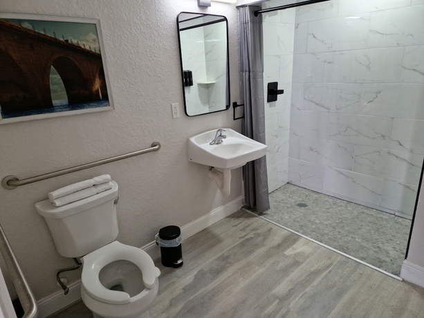 Imagen de la habitación del Hotel Palm Cove Motel. Foto 17