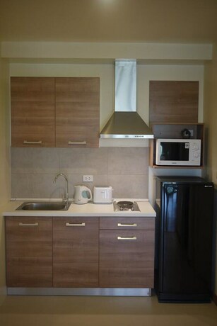 Imagen de la habitación del Hotel Palm Crescent Huahin Resort. Foto 18