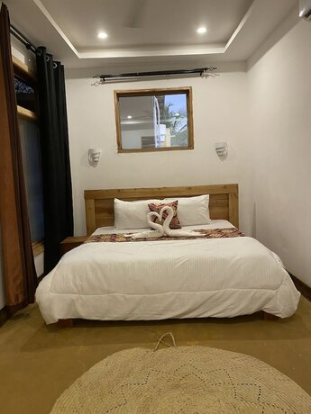 Imagen de la habitación del Hotel Palm Cultural Village. Foto 13
