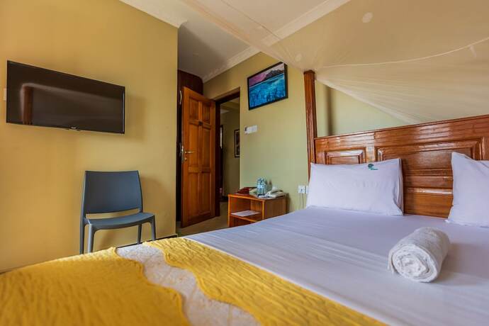 Imagen de la habitación del Hotel Palm Gardens and Guest House. Foto 16