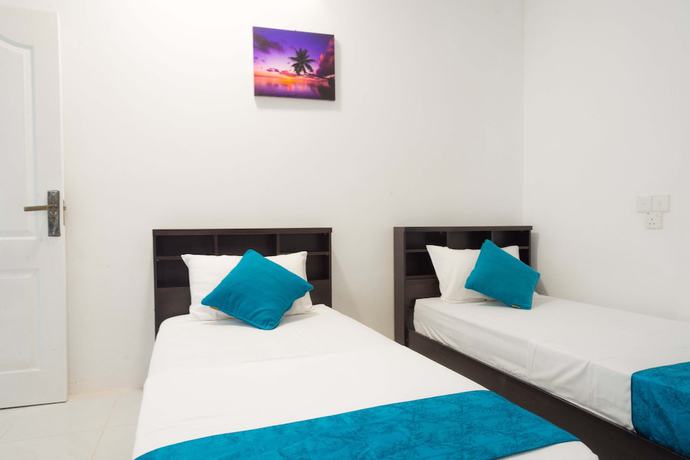 Imagen de la habitación del Hotel Palm Gate Maldives. Foto 10