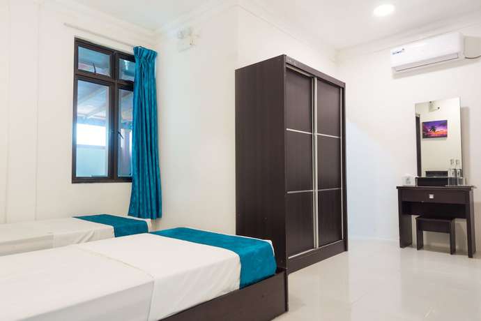 Imagen de la habitación del Hotel Palm Gate Maldives. Foto 11