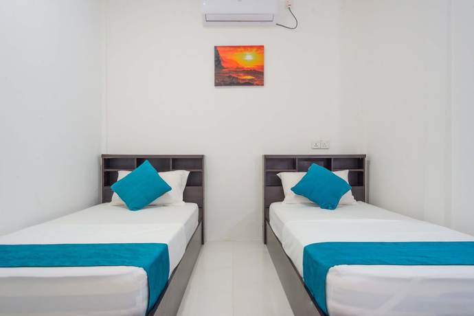 Imagen de la habitación del Hotel Palm Gate Maldives. Foto 13