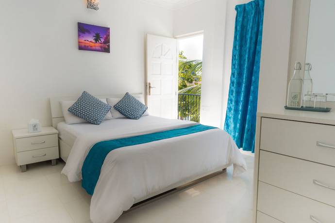 Imagen de la habitación del Hotel Palm Gate Maldives. Foto 15