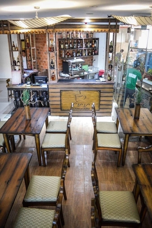 Imagen del bar/restaurante del Hotel Palm Grass. Foto 3