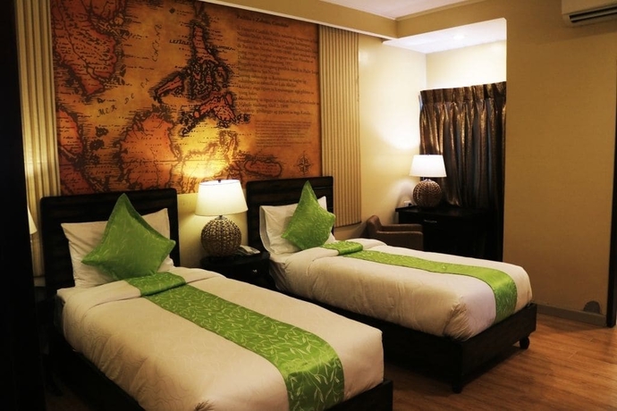 Imagen de la habitación del Hotel Palm Grass. Foto 5