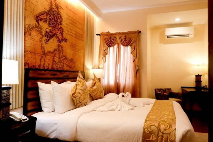 Imagen de la habitación del Hotel Palm Grass. Foto 6