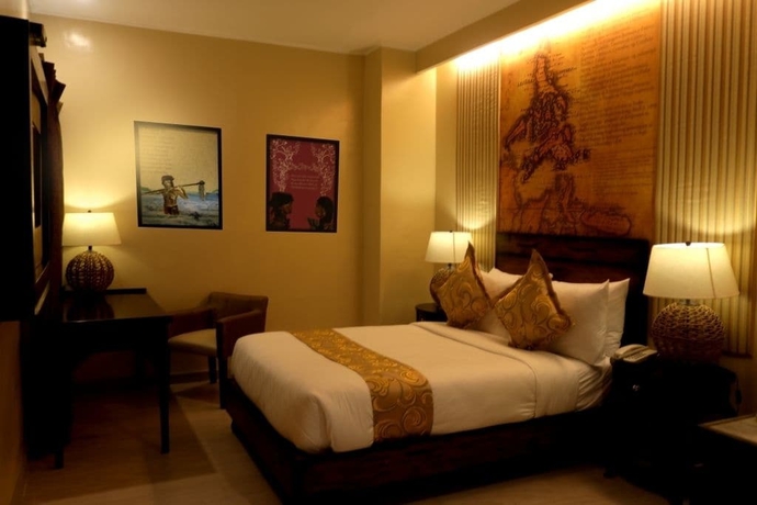 Imagen de la habitación del Hotel Palm Grass. Foto 11