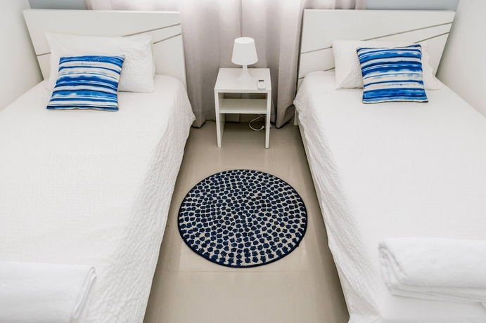 Imagen de la habitación del Hotel Palm Green Vacations Whitesands. Foto 10