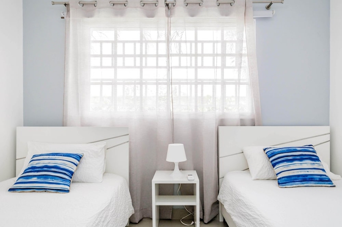 Imagen de la habitación del Hotel Palm Green Vacations Whitesands. Foto 11