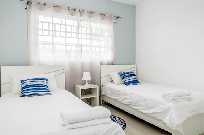 Imagen de la habitación del Hotel Palm Green Vacations Whitesands. Foto 14