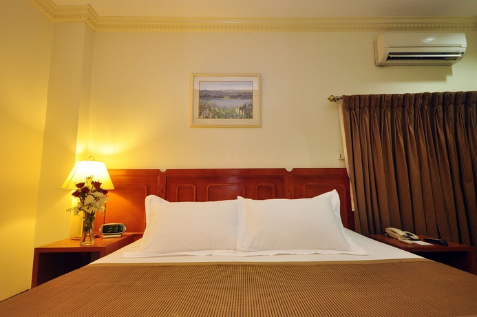 Imagen de la habitación del Hotel Palm Grove, Manila. Foto 8