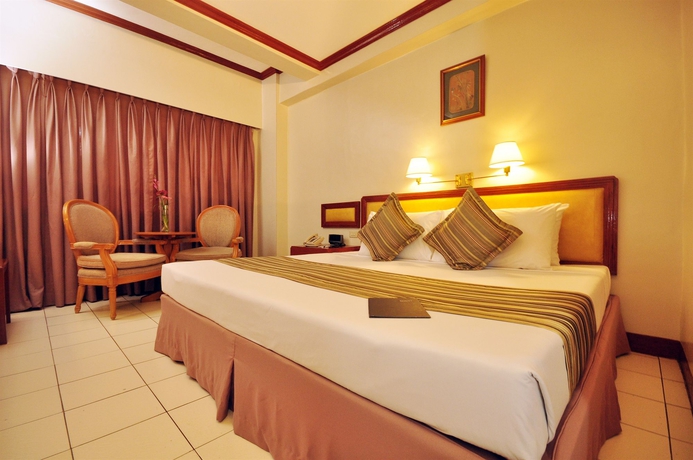 Imagen de la habitación del Hotel Palm Grove, Manila. Foto 9