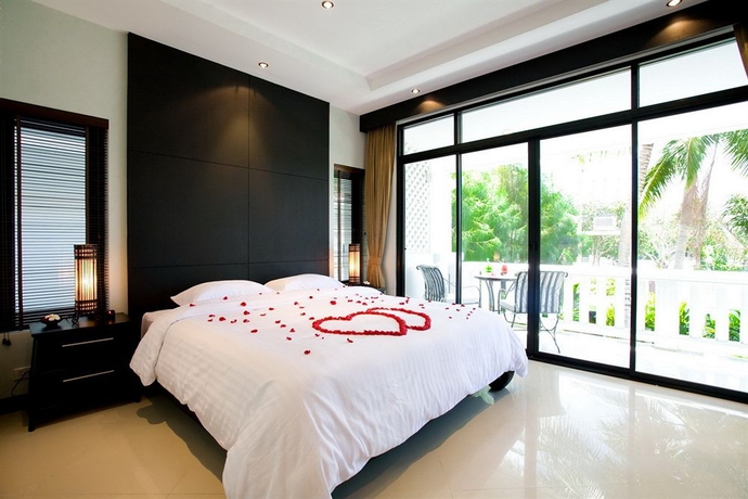 Imagen de la habitación del Hotel Palm Grove Resort. Foto 2