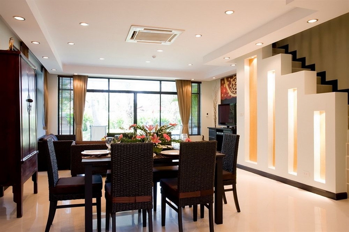 Imagen de la habitación del Hotel Palm Grove Resort. Foto 3