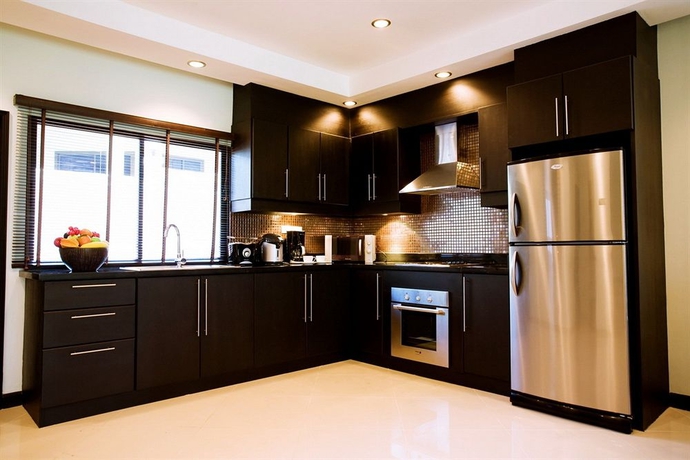 Imagen de la habitación del Hotel Palm Grove Resort. Foto 5