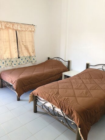 Imagen general del Hotel Palm House white building. Foto 4