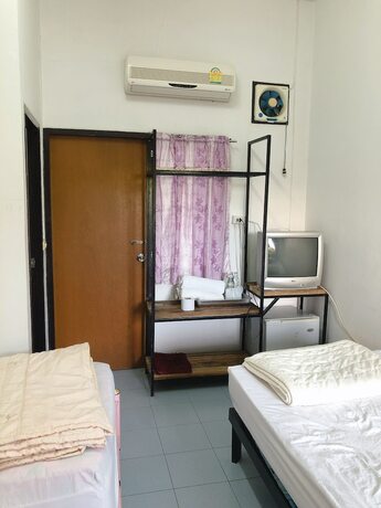 Imagen de la habitación del Hotel Palm House white building. Foto 15