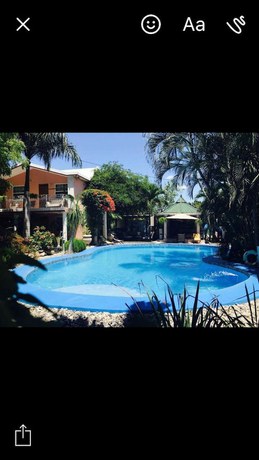 Imagen de la piscina del Hotel Palm Inn, Delmas. Foto 15