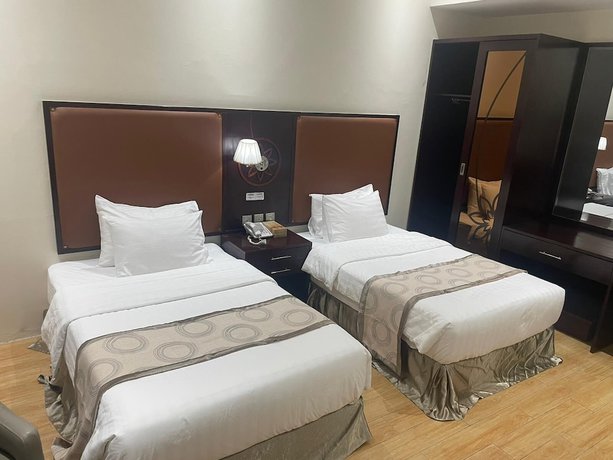 Imagen de la habitación del Hotel Palm Inn Doha. Foto 11