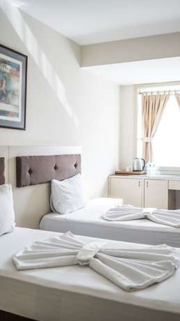 Imagen de la habitación del Hotel Palm Inn, ESMIRNA. Foto 5