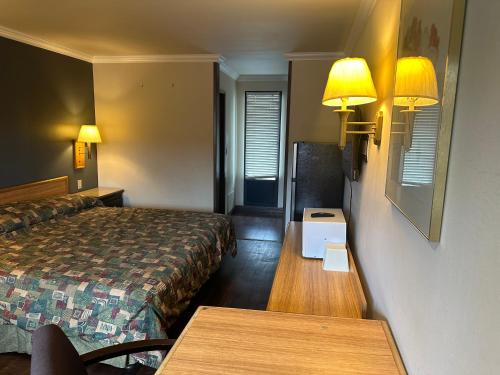Imagen de la habitación del Hotel Palm Inn near Tyler Mall Riverside. Foto 18